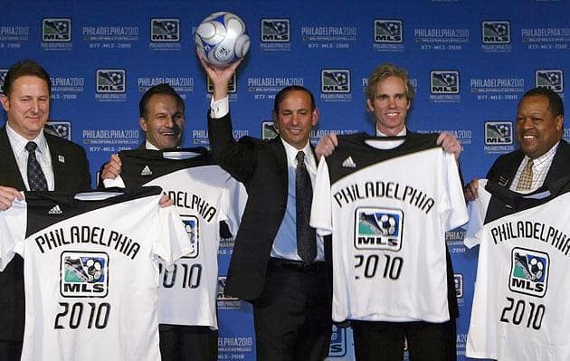 In 2008, Major League Soccer Commissioner Don Garber, holding the ball, announced plans for a new team, the Philadelphia Union, which kicks off its inaugural season next month. (Joseph Kaczmarek/AP)
