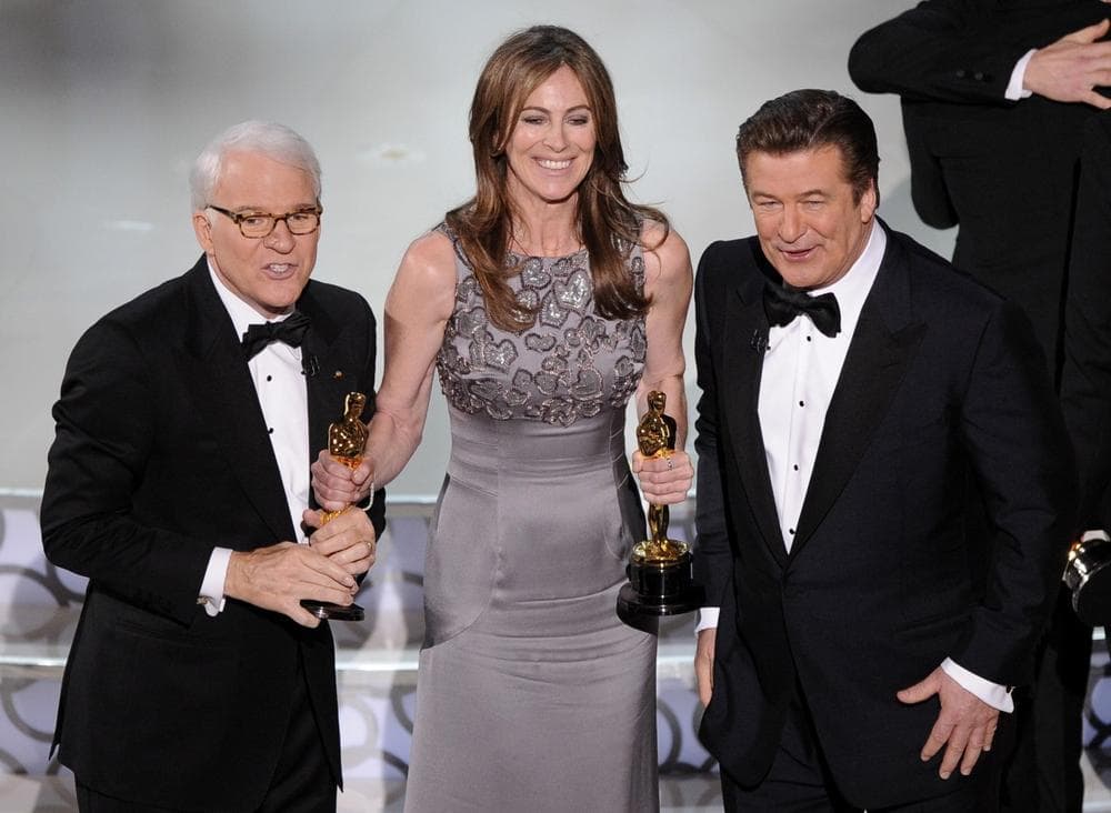 Kathryn Bigelow, center, holds her Oscars for best motion picture of the year and best achievement in directing for &quot;The Hurt Locker&quot; with hosts Alec Baldwin, right, and Steve Martin at the conclusion of the 82nd Academy Awards on Sunday. (AP Photo)