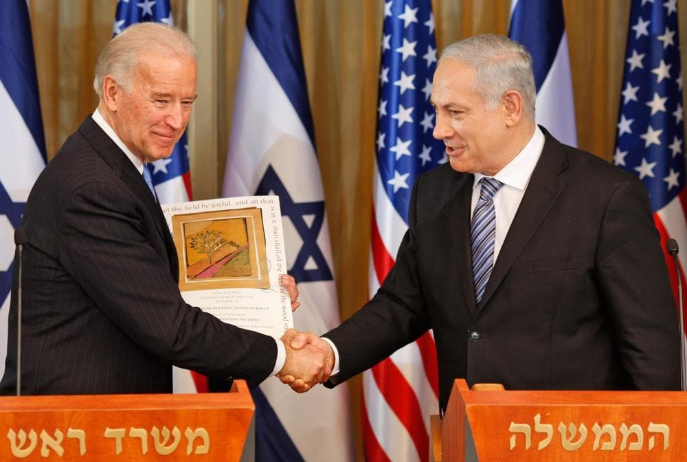 U.S. Vice President Joe Biden shakes hands with Israel's Prime Minister Benjamin Netanyahu at the prime minister's residence  in Jerusalem on Tuesday. (AP)