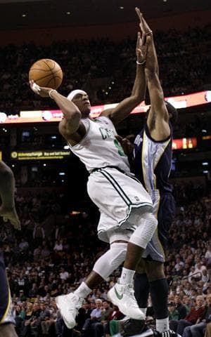 Celtics guard Rajon Rondo shoots against Grizzlies guard Mike Conley during Wednesday&#39;s game in Boston. (AP)
