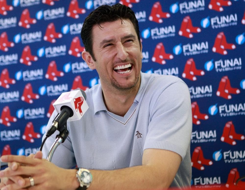 Former Boston Red Sox shortstop Nomar Garciaparra takes questions during a news conference in Fort Myers, Fla. on Wednesday.  The 1997 American League MVP signed a one-day contract with his former team, then announced he's ending his 14-year career. (AP)