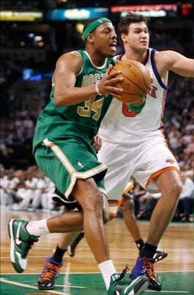 Boston Celtics&#39; Paul Pierce drives to the basket ahead of New York Knicks&#39; Danilo Gallinari during the second half of the game on Wednesday. (Mary Schwalm/AP)