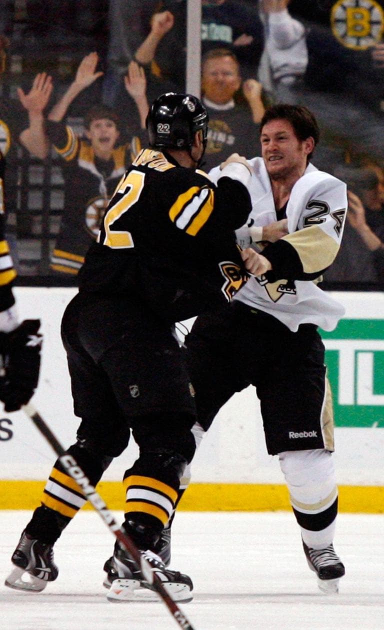 Boston Bruins&#39; Shawn Thornton (22) fights with Pittsburgh Penguins&#39; Matt Cooke (24) early in the the first period of an NHL hockey game on Thursday in Boston. (AP)