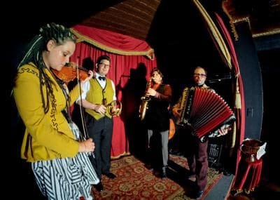 Cirkestra, which started as a circus pit band, is led by clown turned composer and accordionist Peter Bufano, right.