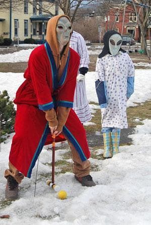 It can't be easy for an alien in a bathrobe to hit a croquet ball in winter. (Karen Given/WBUR)