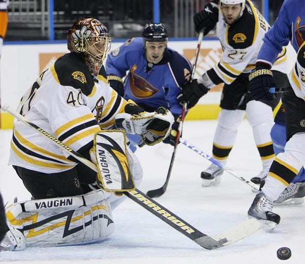 Bruins goalie Tuukka Rask turns away a shot during Tuesday&#39;s game in Atlanta. (AP)