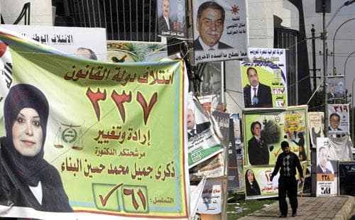 Election campaign posters are seen along a street in Baghdad, Iraq, on Monday, March. 1, 2010. Iraq&#039;s national election is set for March 7. (AP)