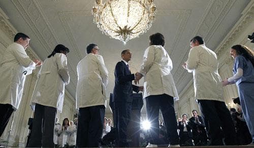 President Barack Obama shakes hands with health care professionals after speaking about health care reform, Wednesday, March 3, 2010, in the East Room of the White House. (AP)