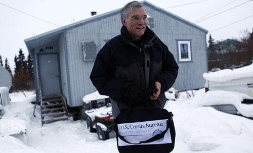 U.S. Census Bureau Director Robert Groves leaves the home of World War II veteran and village elder Clifton Jackson, 89, in the remote Inupiat Eskimo village Noorvik, Alaska., Monday, Jan 25, 2010, after counting him to formally launch the nation&#039;s 2010 census. (AP)