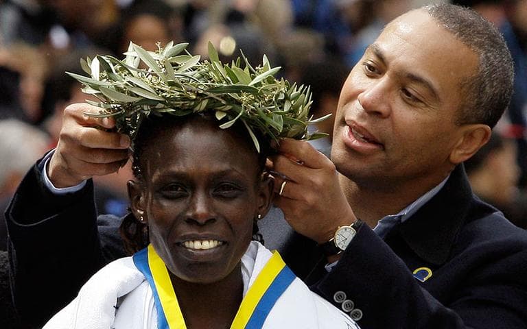 Women's winner Salina Kosgei, of Kenya, is crowned with the laurel wreath by Gov. Deval Patrick at the finish area at the 113th running of the Boston Marathon on April 20, 2009. (AP)