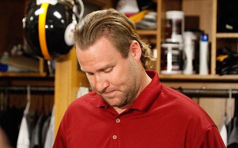 Pittsburgh Steelers quarterback Ben Roethlisberger reads a statement in the team&#39;s locker room on Monday. Roethlisberger says he is &quot;happy&quot; to put sexual assault allegations behind him and knows he must work to regain the trust of teammates and fans. (AP)