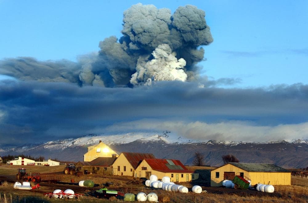 The volcano in southern Iceland's Eyjafjallajokull glacier sends ash into the air just prior to sunset  Friday.