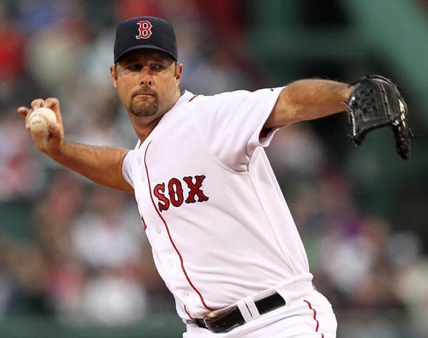Boston starting pitcher Tim Wakefield delivers a knuckleball against Texas during the first inning of the game in Boston on Tuesday. (AP Photo)