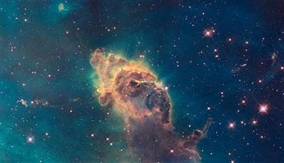 This image, taken by the refurbished Hubble Space Telescope, shows stars bursting to life in the chaotic Carina Nebula. (AP)