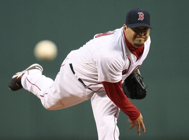 Boston starting pitcher Josh Beckett delivers during the first inning of the game against Texas at Fenway Park in Boston on Wednesday. (AP)