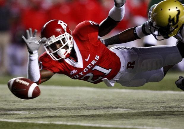 Devin McCourty dives for a fumble during a NCAA football game on Nov. 12, 2009. McCourty was drafted by New England on Thursday. (AP)