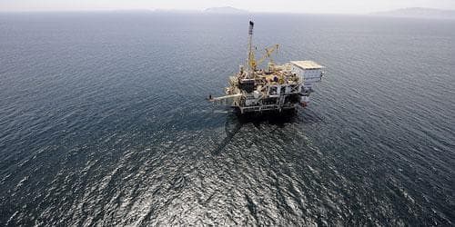 An offshore oil drilling platform off the coast of California is seen in May 2009. (AP)