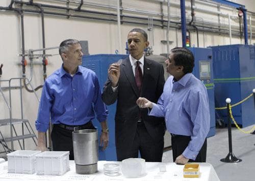 President Obama, with Dr. Kedar Gupta, right, and Dr. Carl Rick Schwedtfeger, left, from Arc Energy during his tour of an L.E.D. lighting manufacturer in Nashua, N.H., Tuesday, Feb. 2, 2010. (AP)