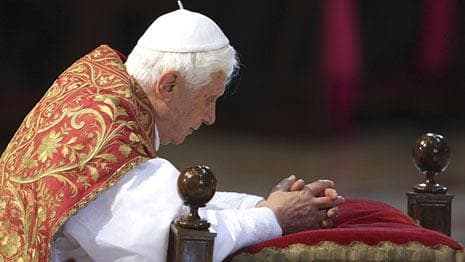 Pope Benedict XVI kneels during a service in St. Peter&#039;s Basilica at the Vatican, April 2, 2010. (AP)