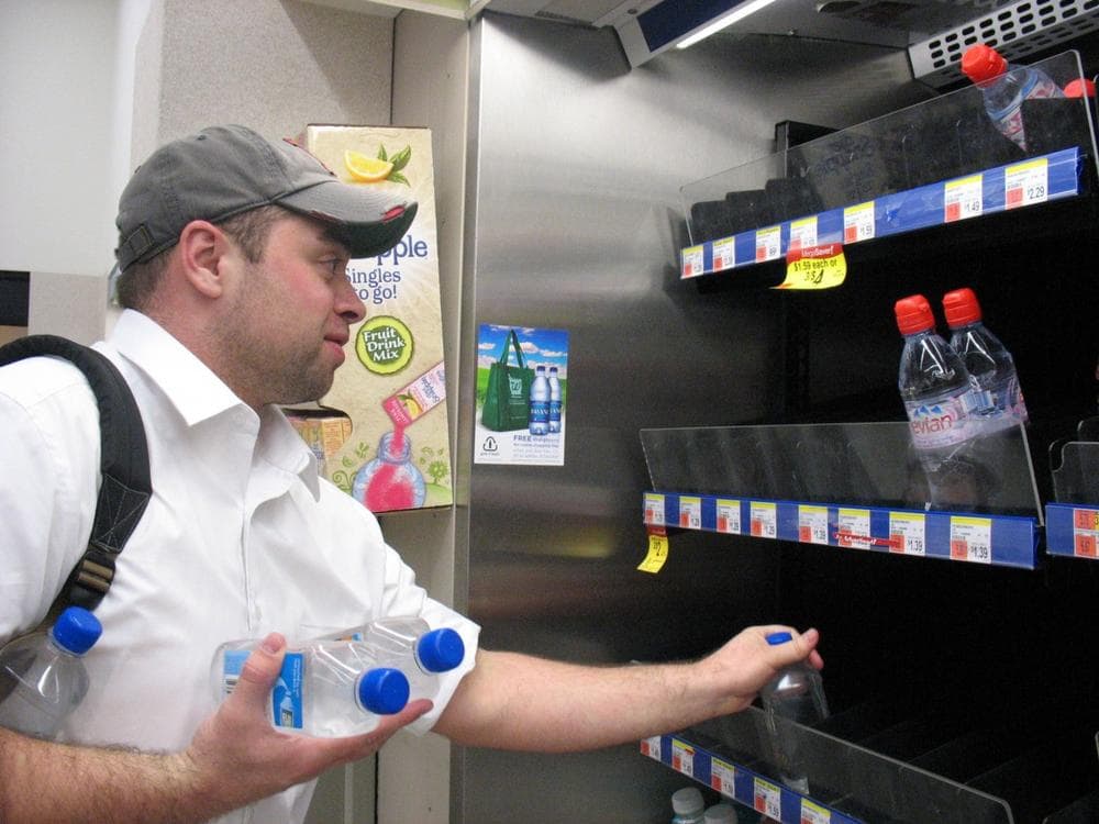 Mike Sullivan was lucky to get the last few bottles of water at a Boston drug store. (Monica Brady-Myerov/WBUR)