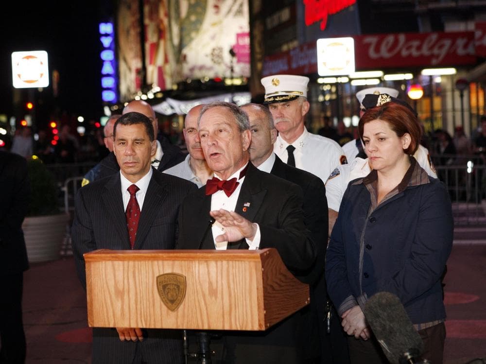 Mayor Michael Bloomberg, center, Governor David Paterson, left, and Speaker Christine C. Quinn, right hold a news conference in Times Square early Sunday morning,  near where a car carrying three propane tanks, fireworks and two filled 5-gallon gasoline containers was found Saturday night.  (AP Photo/David Karp)