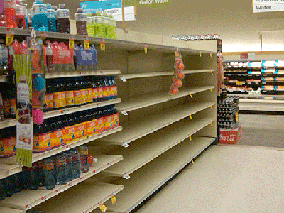 The water shelves at the Shaw&#39;s Supermarket in Canton were emptied again on Sunday. (Steve Brown/WBUR)