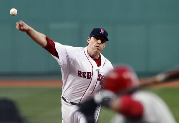 Boston's John Lackey pitches against Los Angeles in the first inning of the game on Wednesday in Boston. (AP)