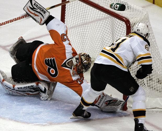 Philadelphia goalie Brian Boucher can't stop the shot by Boston's Miroslav Satan fom going in the net in the first period of Game 3 of a second-round playoff hockey series on Wednesday in Philadelphia. (AP)