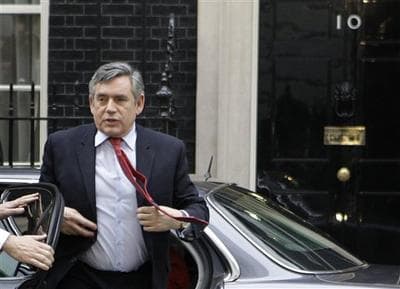 British Prime Minister Gordon Brown arrives at Downing Street in London. (AP)