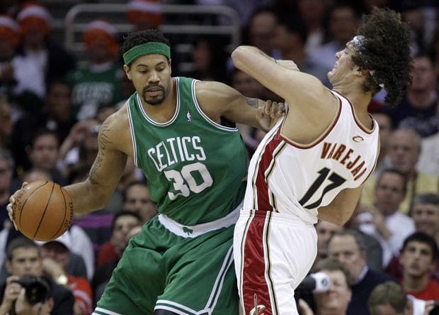 Boston's Rasheed Wallace commits an offensive foul against Cleveland's Anderson Varejao in the first quarter of Game 5 of a second round playoff series on Tuesday in Cleveland. (AP)