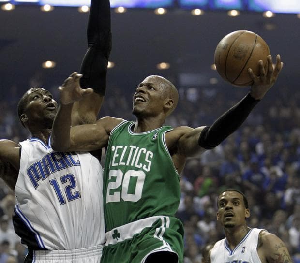 Boston guard Ray Allen takes a shot over Orlando center Dwight Howard during the first half in Game 1 of the NBA Eastern Conference finals in Orlando, Fla. on Sunday. (AP)