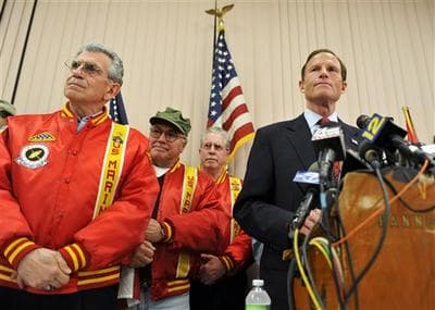 Connecticut Attorney General and Democratic candidate for U.S. Senate Richard Blumenthal, right, stands with veterans as he addresses a report that he has misstated his military service during the Vietnam War at a news conference in West Hartford, Conn. (AP)