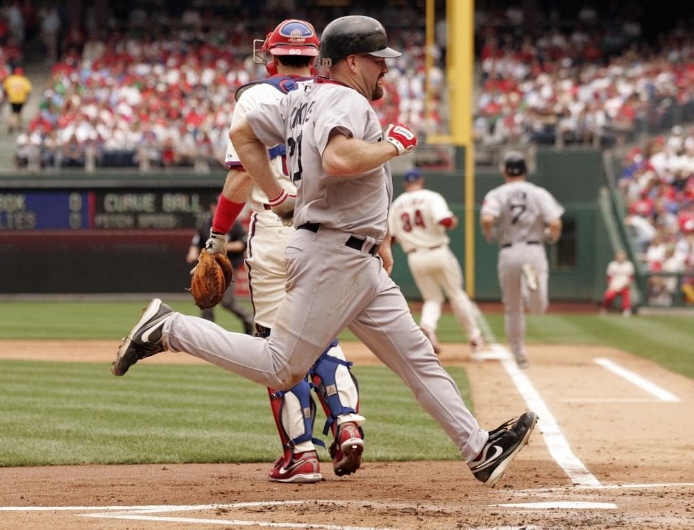 Boston's Kevin Youkilis scores on a ground out by J.D. Drew during the second inning of in an interleague baseball game with Philadelphia on Sunday in Philadelphia. (AP)