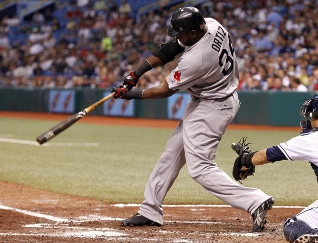 Boston's David Ortiz doubles, knocking in two runs in the third inning of a baseball game against Tampa Bay on Tuesday in St. Petersburg, Fla. (AP)