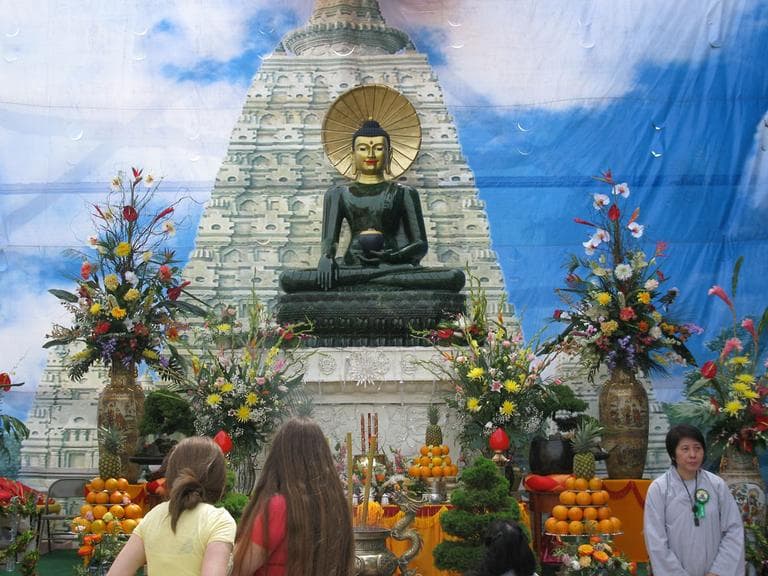 The statue of Buddha, the spiritual teacher from ancient India who founded Buddhism, is made of jade. It weighs four tons and is worth $5 million. (Deborah Becker/WBUR)