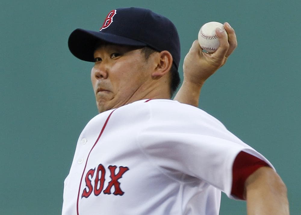 Boston starter Daisuke Matsuzaka delivers against Kansas City during the first inning of the game in Boston on Thursday. (AP)