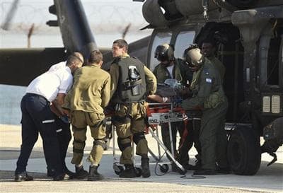 Israeli medics rush an injured man for treatment at the Rambam hospital in the northern Israeli city of Haifa.. (AP) 