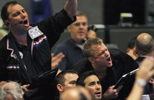 Traders shout orders in the S&amp;P 500 futures pit at the CME Group in Chicago near the close of trading, Thursday, May 6, 2010, the day the Dow Jones industrials plunged nearly 1,000 points in half an hour. (AP)