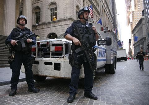 The New York Police Department&#039;s Emergency Service Unit patrols the financial district in New York on Friday, May 7, 2010. (AP)