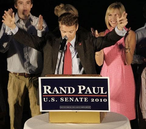 Republican U.S. Senate candidate Rand Paul raises his arms to his supporters at his victory party in Bowling Green, Ky., May 18, 2010. (AP)