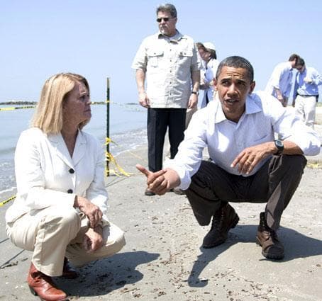 President Barack Obama, right, and LaFourche Parish president Charlotte Randolph take a tour of areas impacted by the Gulf Coast oil spill on Friday, May 28, 2010 in Port Fourchon, La. (AP)