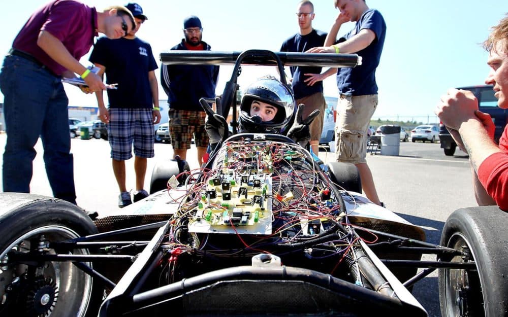 University of Manitoba student Christian Fay, 22, sits behind the wheel of the school&#039;s formula hybrid racing car at the fourth-Annual Formula Hybrid International Competition at the New Hampshire Motor Speedway in Loudon, N.H., Wednesday, May 5, 2010. (AP Photo)