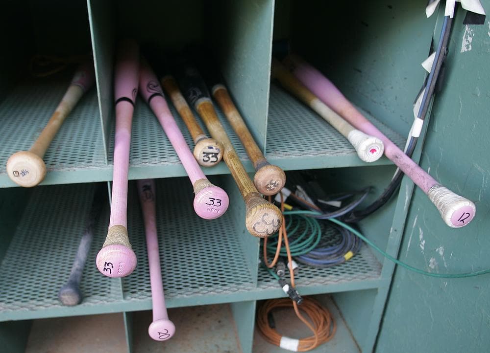 Pink bats for Mother's Day in the Red Sox dugout. (AP)