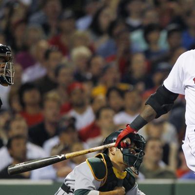 Boston designated hitter David Ortiz watches the flight of his two-run home run off Oakland pitcher Ben Sheets during the fifth inning of the game in Boston on Wednesday.(AP)