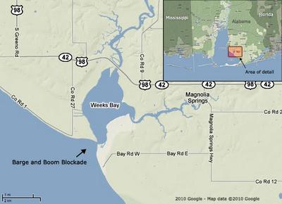 This Google map shows the 600-foot mouth of Weeks Bay near Magnolia Springs, Ala.  Residents have put barges with booms in place to prevent oil from crossing into the bay. 