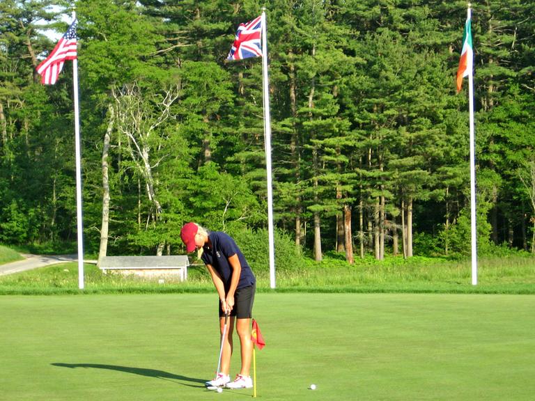 U.S. Curtis Cup golfer Jessica Korda, of Bradenton, Fla., 17, works on her putting game at Essex County Club after a practice round in May. (Doug Tribou/WBUR)
