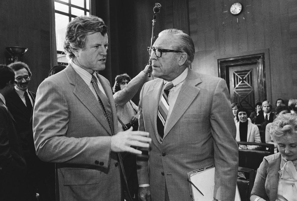 Sen. Kennedy, then Senate Judiciary Committee chairman, speaks with former FBI Director Clarence Kelly prior to hearings on the 1979 FBI Charter Act. (AP)