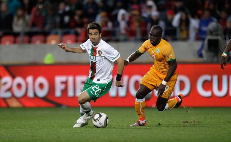 Portugal&#39;s Deco, left, and Ivory Coast&#39;s Cheick Tiote during their World Cup Group G match on Tuesday. The match ended 0-0 to the consternation of many watchers. (AP)