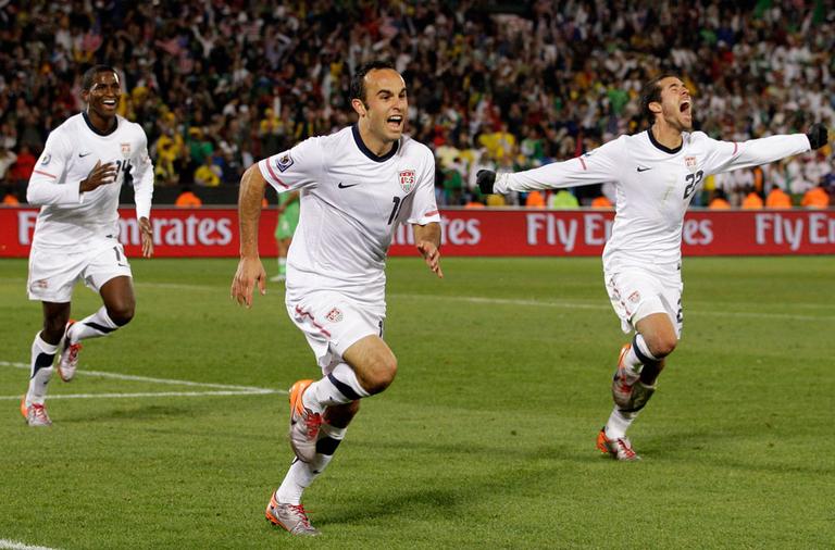 United States' Landon Donovan, center, celebrates after scoring a goal with team members Benny Feilhaber, right, and Edson Buddle, left, during a match against Algeria in Pretoria, South Africa, on Wednesday. (AP)