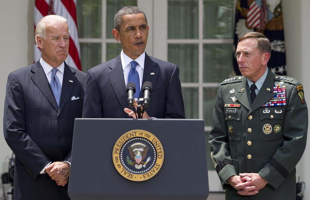 President Barack Obama, accompanied by Vice President Joe Biden and Gen. David Petraeus announces that Petraeus would replace Gen. Stanley McChrystal as the top commander in Afghanistan.  (Evan Vucci/AP)